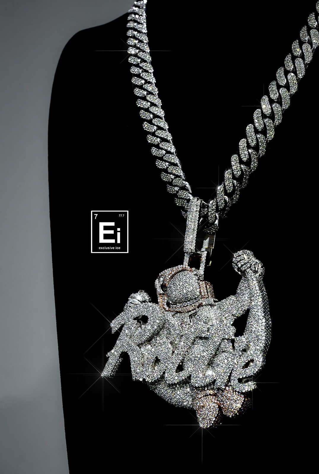 Custom diamond "RAGE" nameplate pendant with astronaut charm on a diamond Cuban link chain